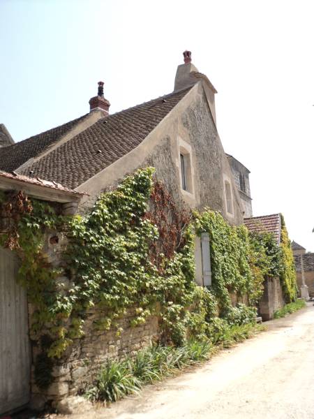 Rénovation d'une couverture en tuiles plates anciennes à Saint-Romain chez un particulier