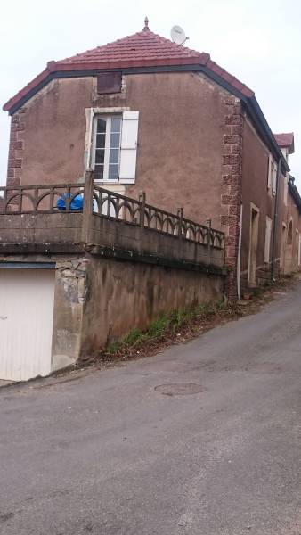 Rénovation d'une toiture en tuiles mécaniques à Saint Romain, chez un particulier