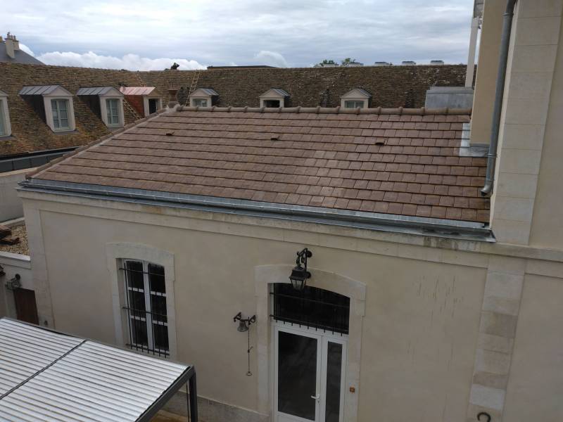 Restauration d'une couverture en tuiles mécaniques chez un particulier à Pommard